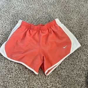 Nike pink and white running shorts, size M kids